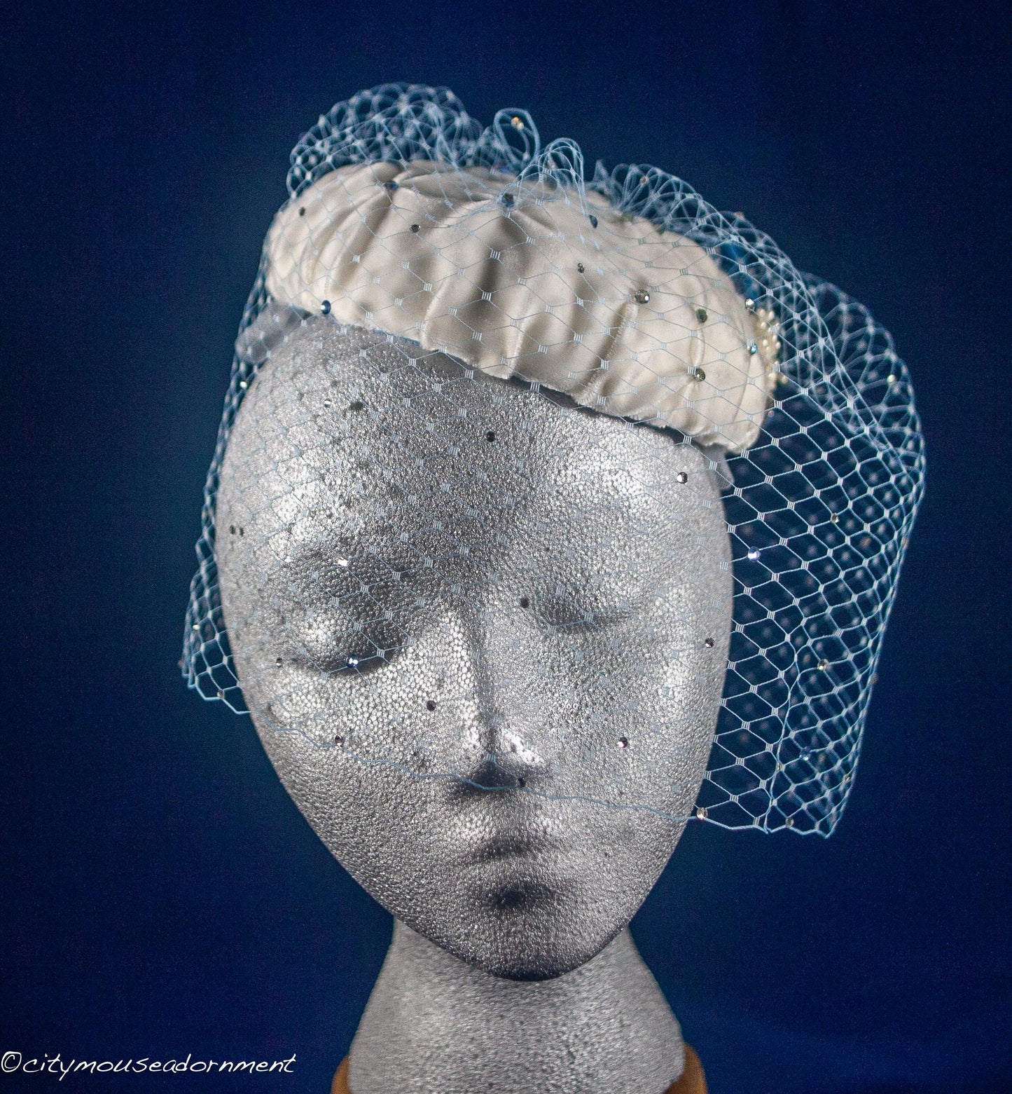 Velvet Blues -Ivory and Blue Pillbox hat with net veil